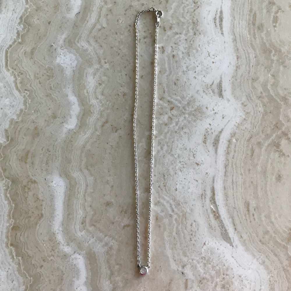 SILVER TONE NECKLACE WITH WHITE RHINESTONE